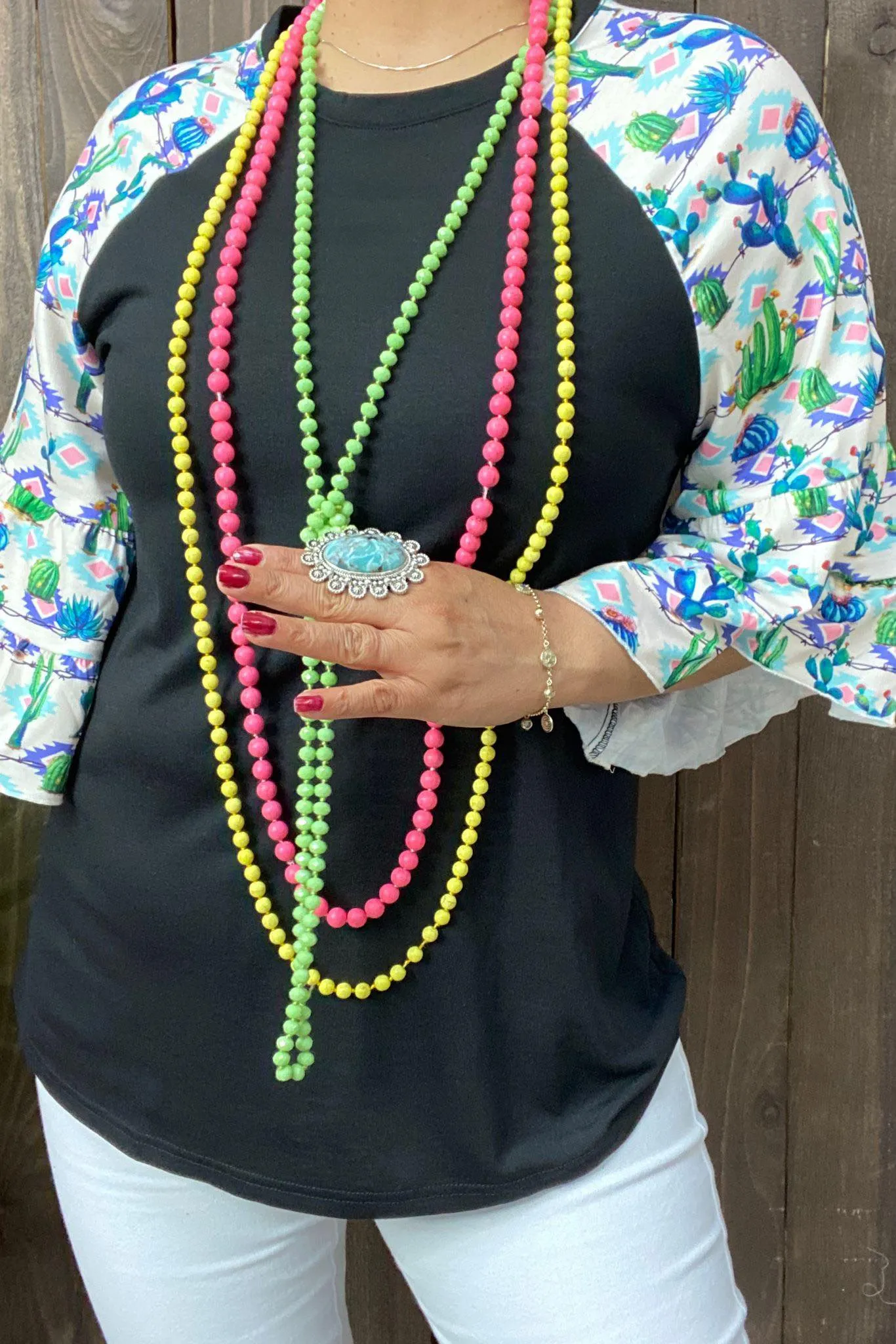 Black Top with Blue cactus & tribal print bell sleeves